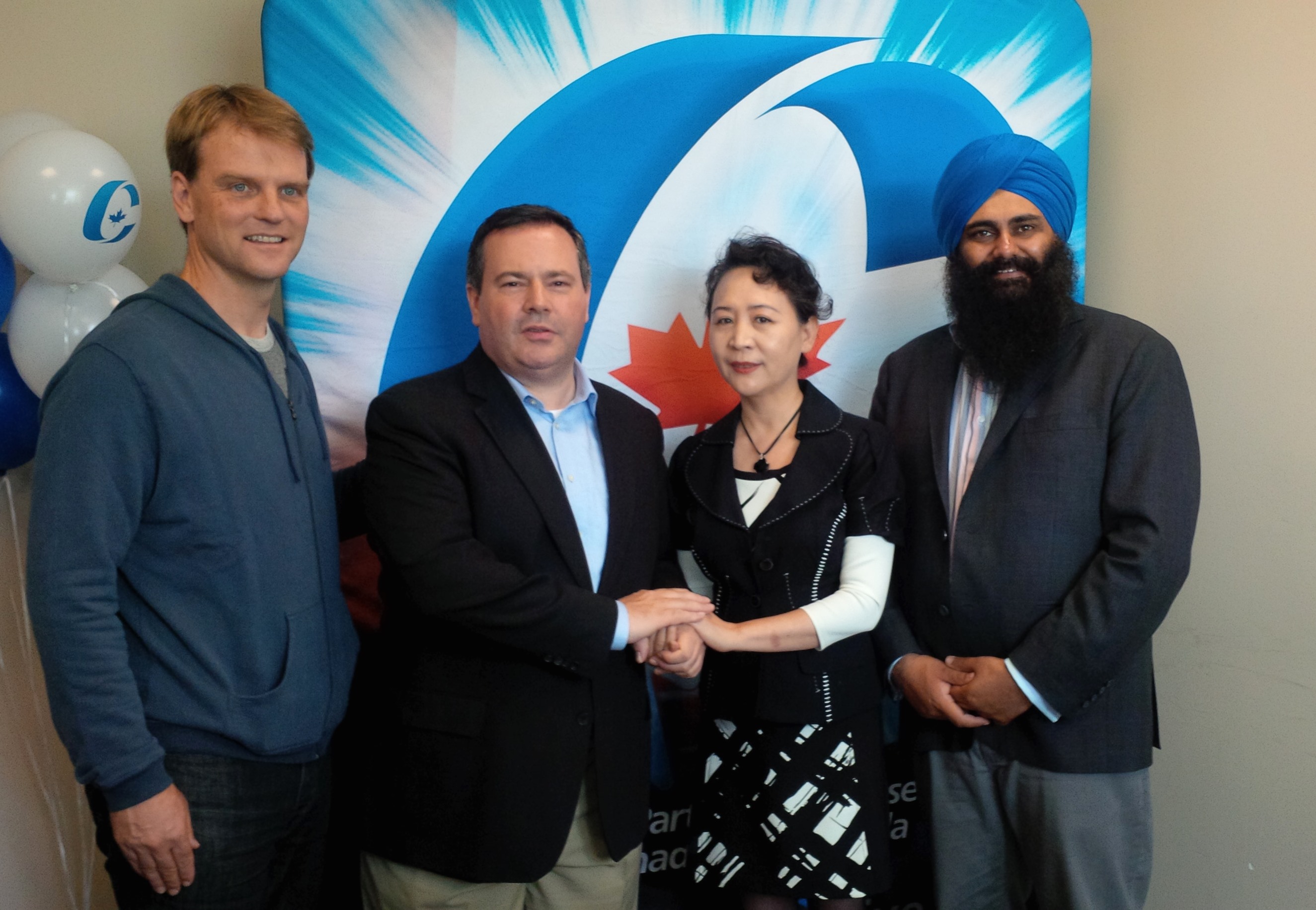 Sheng Xue and three Canadian federal ministers