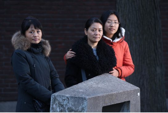 Chu Ling,and Gu Shu-hua with her daughter Dong Xue-rui. By Steve Russell of Toronro Star